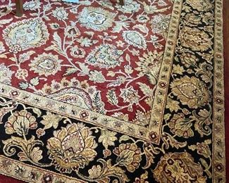 Large traditional fringed rug.