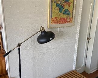 Modern metal swing arm lamp.