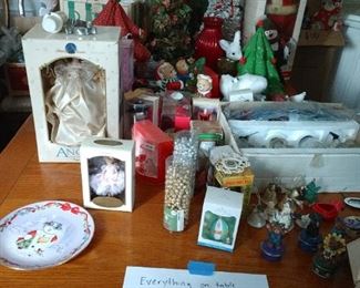Entire Content on table and 5 boxes Christmas Decorations. $50