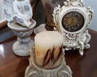 Timekeepers clock and Athena marble stands with angel and candle