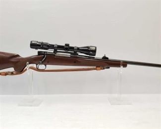 #952 • Winchester 70 7MM Rem Mag Bolt Action Rifle And Scope
