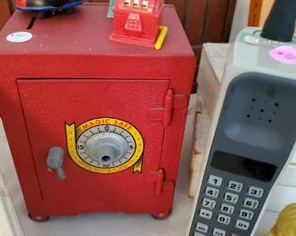 Vintage tin ladybug toy, Magic Safe, old "brick" cell phone