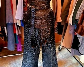 Black sequined strapless top, bell bottom pants and belt that Cher would have been proud to wear. Needs some repair