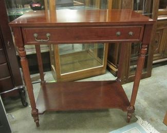 BOMBAY SIDE TABLE WITH DRAWER. HAS BOTH DRAWER PULLS. 32" WIDE, 18" DEEP, 33" TALL
