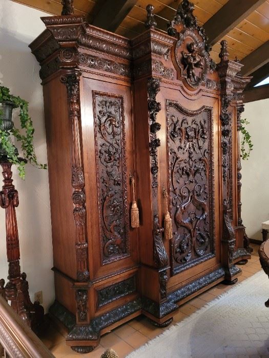 Magnificent Renaissance Revival Armoire cabinet. Absolutely perfect condition. 9 1/2 ft. Tall