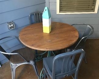 Table with wood top and iron base, metal chairs - will sell separately or as a set.