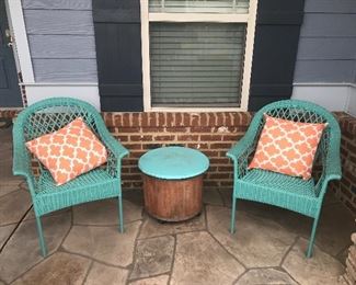 Cute and comfy!!! Chairs are plastic wicker pattern perfect for outdoor conditioning. Very cool table with storage.