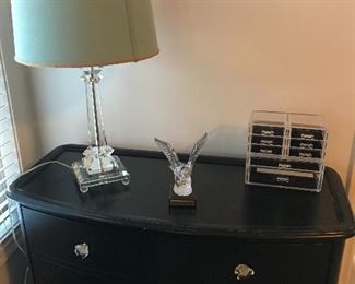Dresser sold today. The items on the dresser are still available. The eagle is lead crystal.