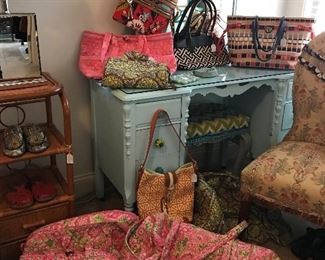 We have several Vera Bradley pieces in many sizes, shapes, patterns and colors. We also have several Spartina 449 purses in like new condition.