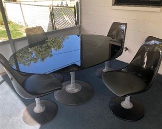 Chrome Craft Smoked glass dinette with 4 Smoked acrylic pedestal chairs.  