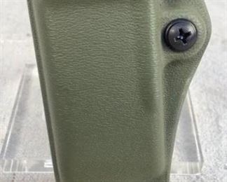 Mfg - G-CODE Double stack
Model - single magazine holster
Located in Chattanooga, TN
This lot contains one G-CODE double stack single magazine holster. This holster is in OD green and will fit most double stack 9mm and 40 S&W magazines. Includes belt slide attachment which fits up to 1 3/4" belts.