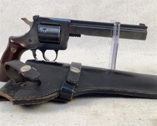 Serial - AY073025
Mfg - H&R Inc.
Model - Model 603 Revolver
Caliber - 22 Magnum
Barrel - 6"
Capacity - 6
Type - Revolver, Double Action
Located in Chattanooga, TN
Condition - 3 - Light Wear
This is an H&R Inc Model 603 featuring a slab-sided barrel. This revolver is collected by many rimfire revolver collectors out there. This particular example comes with a blued finish and wooden grips with H&R medallions. This revolver also comes with a black leather belt holster. This revolvers front sight needs to be tightened down/replaced however.

(LEO SEARCH & SEIZURE)
