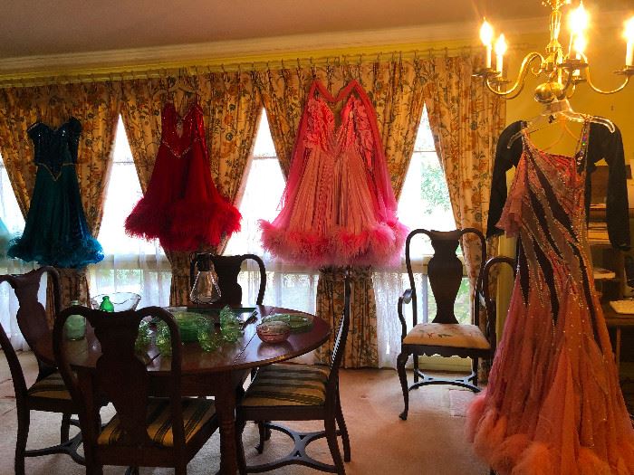 The house is festooned with feathered dance dresses!