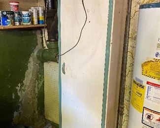 Antique metal storage cabinet; 18"w X 65"h X 12"d