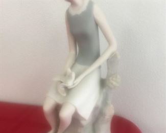 Vintage Girl With a Bird Figurine