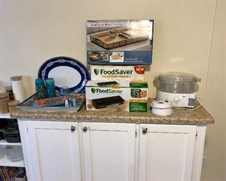 Kitchen items including Food Saver System 