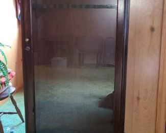 https://ctbids.com/#!/description/share/719335 Gun cabinet is perfect for rifles has a place for six to fit perfectly. Lower part and glass front both lock to safely store guns, ammo and necessary things. Two shelves in cabinet on bottom. Cabinet fully measures 25" x 14" x 60".

