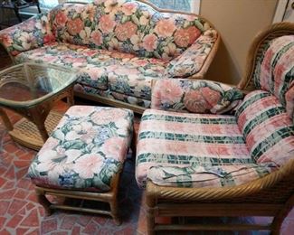 https://ctbids.com/#!/description/share/719373 Lane Venture wicker and floral fabric sofa, chair with ottoman and glass top table. Set your sunroom like you are on the Golden Girls.

Sofa (90"x 34"x34"), chair (37"x36"x34"), ottoman (25"x19"x16"), and table (27"x24"x21").