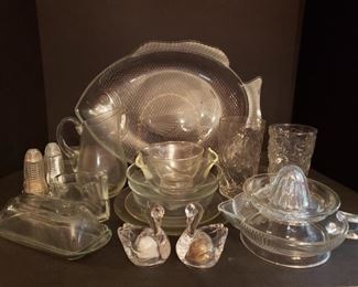 https://ctbids.com/#!/description/share/719427 Includes plates, bowls, large fish platter, salt and pepper shaker sets, butter dish, juicers and glasses.

