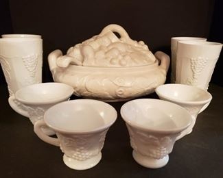 https://ctbids.com/#!/description/share/719467 Gibson Housewares white dishes with embossed grape  design.
Eight 6"H cups, twelve 3"H cups and 11"H x 8"L soup tureen.