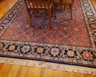 https://ctbids.com/#!/description/share/719477 Karastan 100% wool rug in Serapi pattern. Rug is coral with blue border and measures 104"W x 151"L.

