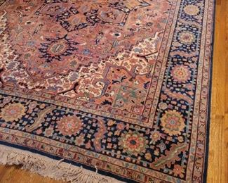 https://ctbids.com/#!/description/share/719488 9’x12’ Heriz pattern wool Karastan rug. Rug is coral, yellow and shades of blue.

