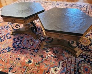 https://ctbids.com/#!/description/share/719485 The black stone tops do slide off but are very heavy so they stay put unless trying to move them. The tables stand 16" tall and 22" wide.


