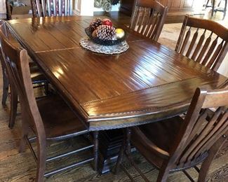 Available for presale! Text at (708)846-0259 to inquire. Wonderful double pedestal wood table + 8 chairs + 2 leaves