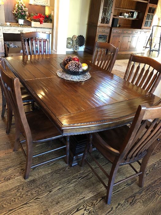 Available for presale! Text at (708)846-0259 to inquire. Wonderful double pedestal wood table + 8 chairs + 2 leaves