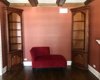 Walter E Smithe corner display shelves and red chaise lounge