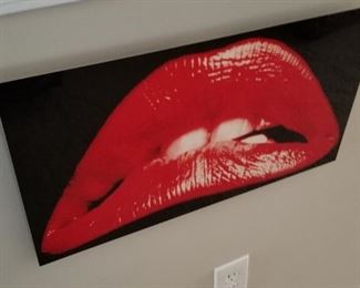 " Rocky Horror Lips" is on a plate of glass