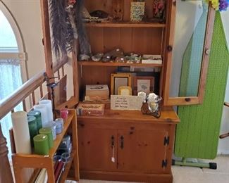 Bookcase (originally gun case).  "Exotic" items.  Candles.