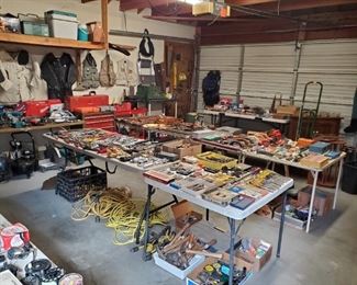 Amazing Garage with hand & power tools, Fishing, Camping, Gun accessories & so much more.