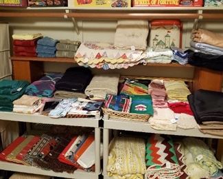 Nice vintage & newer linens, towels, sheets, blankets & quilts.  Tons of board games.
