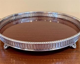 Item 7:  Round lacquered wood serving tray with silverplate gallery - 26" x 14":  $45