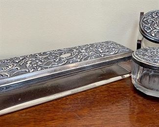 Item 96:  Swedish antique silver covered box - 8.5" x 1.5":  $165                                                                                                                             Item 97:  (2) Swedish Silver trinket jars - 1.75":  $75/Both 