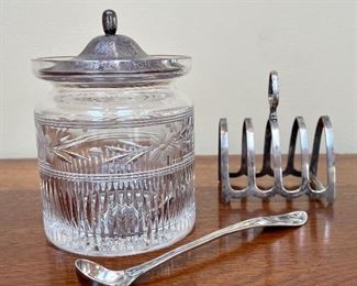 Item 121:  Jam Jar with Sterling Lid and  Spoon - 4":  $35                         Item 122:  English Sterling Toast Stand:  $48