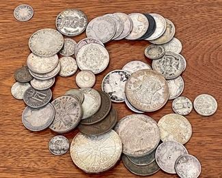 Item 104:  Lot of Foreign Sterling Coins:  $145