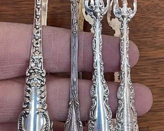 Item 123:  Sterling Tongs (Left):  $32      SOLD!!!                                                 Item 124:  Sterling Tongs (2nd from Left):  $28  SOLD!!!                                                           Item 125 A & B:  Sterling Tongs (3rd & 4th from Left): $25 ea SOLD