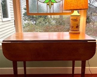 Item 390:  Antique Drop Leaf Table: $445                                                                         Open - 36"l x 34"w x 28"h                                                                                       Closed - 36" x 18"w x 28"h