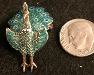 Item 339:  Small Antique Sterling Siam Peacock Pin - hinged so the tail feathers move: $30