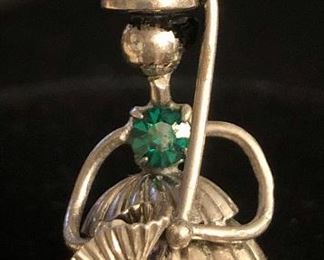 Item 338:  Small Antique Lady with Umbrella Pendant with Green Stone: $24