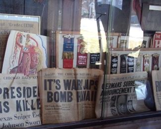 SELECTIONS OF HEADLINE NEWSPAPERS AND MICHIGAN LODGE BADGES.