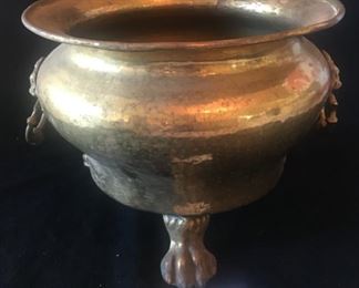 FOOTED BRASS CACHE POT WITH LION HANDLES