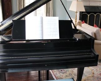 1934 Chickering grand piano with needlepoint bench.