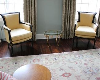 Pair French Empire ebonized Bergere chairs with gilt decoration