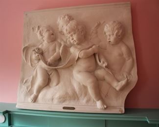 Cupid relief plaque