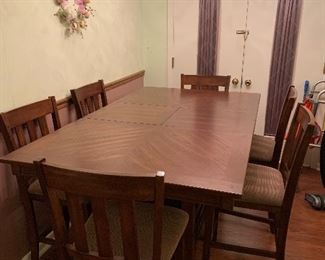 Like new high top dining room table with 6 chairs