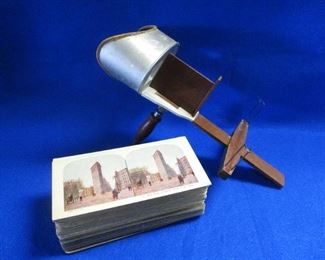 STEREO OPTIC VIEWER WITH A STACK OF PHOTO CARDS