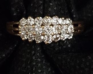 https://ctbids.com/#!/description/share/721047 Surprise the woman you love with this absolutely gorgeous diamond ring. Twenty-one diamonds sparkle in the yellow gold setting. Our cameras couldn't quite capture the true beauty that this ring exudes. Ring is approximately a size 7. Diamonds registered as authentic using the HDE Diamond Selector II diamond tester and were verified by a jeweler. 10K gold. Weighs 3 grams.
